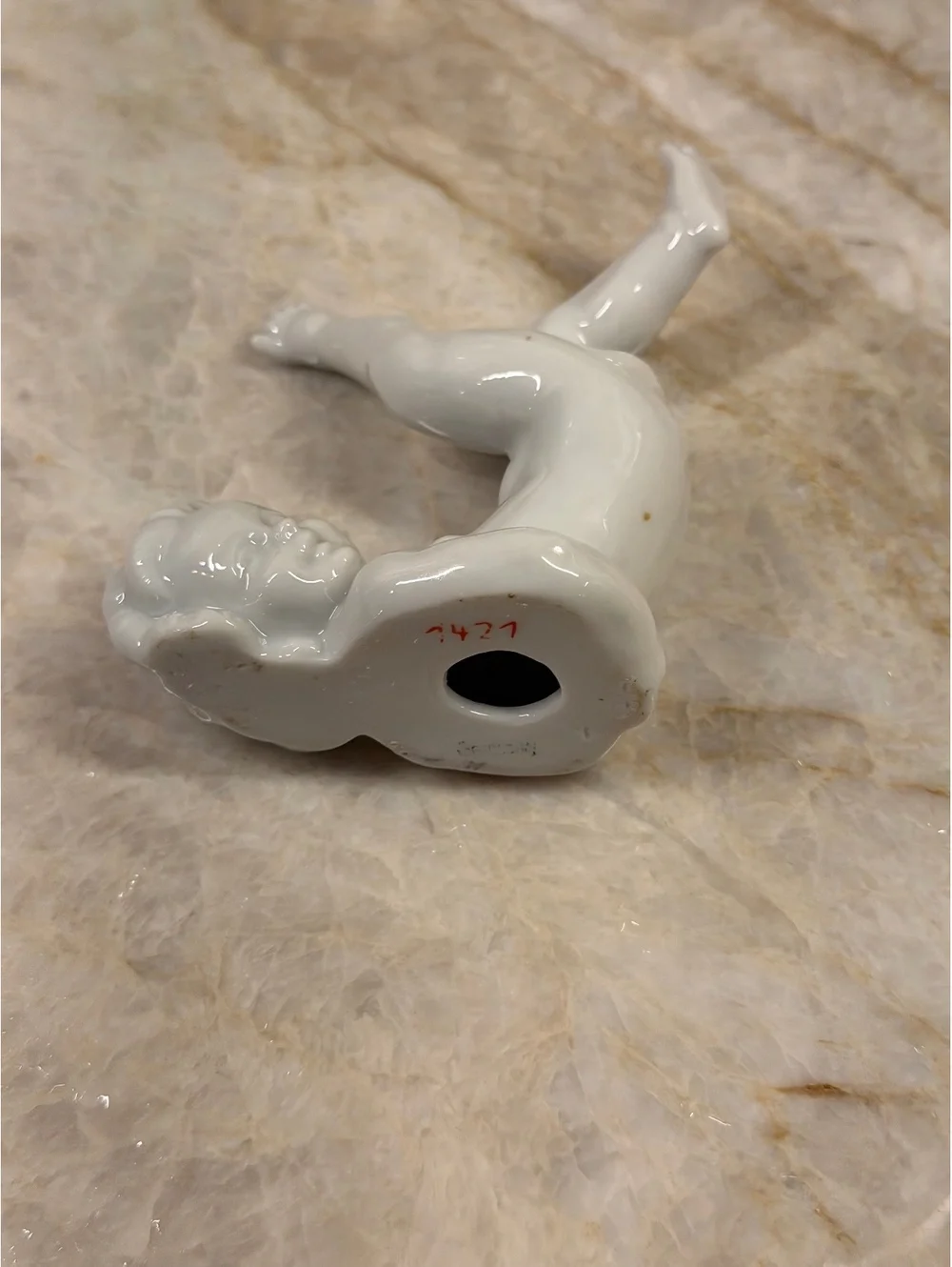 Vintage Porcelain Tumbling Cherub Figurine